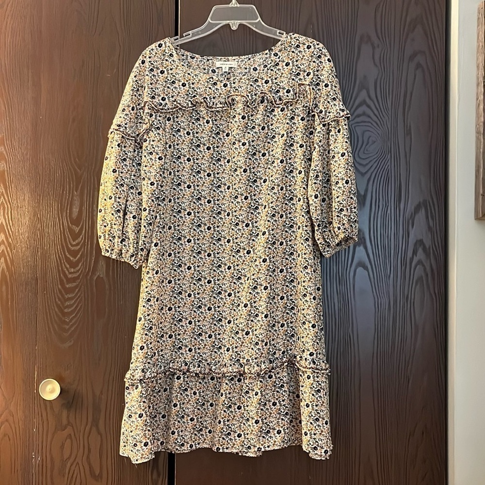 Max Studio  cream dress with black/green/ orange floral design. 3/4 sleeves. Med